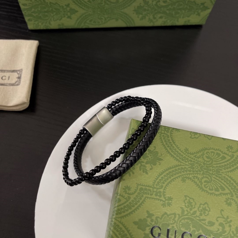 G*u*i bracelets